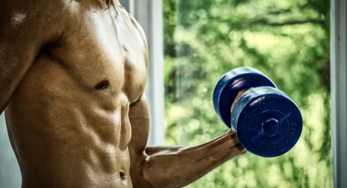 shirtless-young-athlete-doing-bodybuilder-workout-2026-01-07-07-28-13-utc