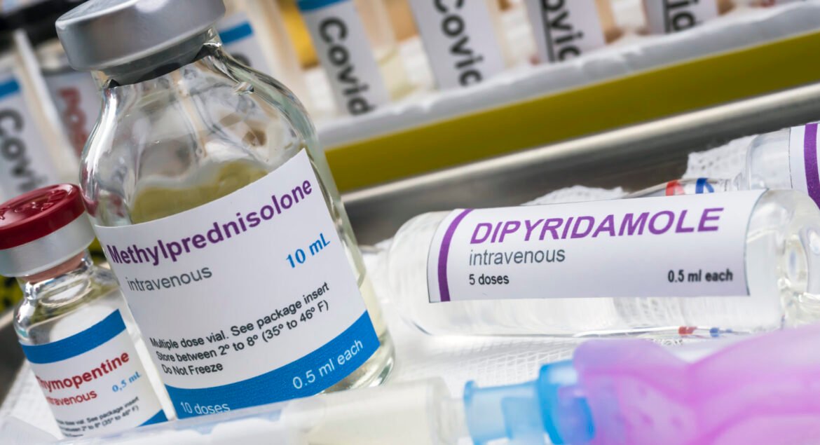 Diverse medication prepared to treat Kawasaki disease related to Sars-CoV-2 in children under one year old, conceptual image, unbranded generic drug containers and hypothetical bar codes