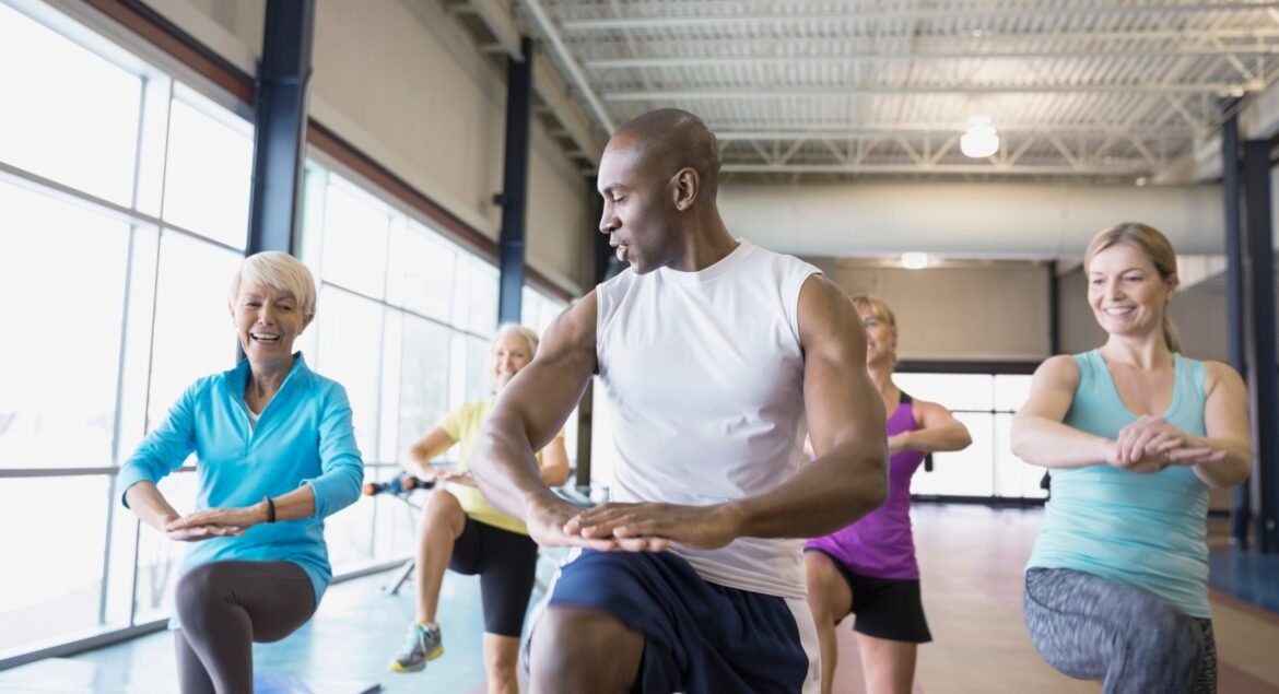 personal-trainer-guiding-women-at-gym-2026-01-11-08-40-30-utc