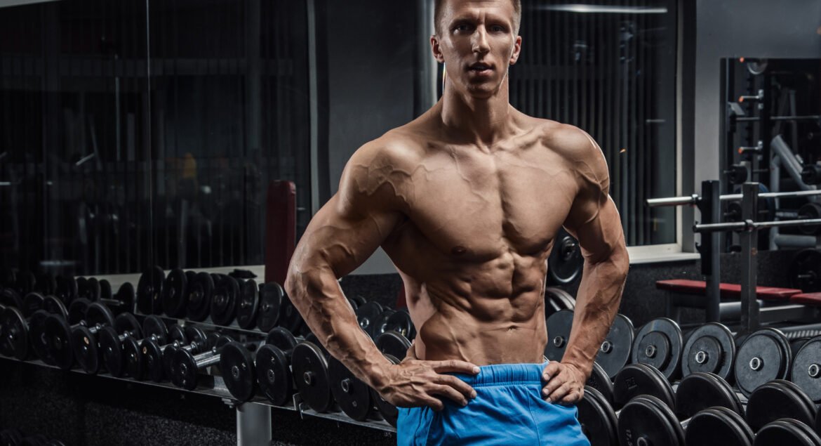 Muscular man in gym during workout